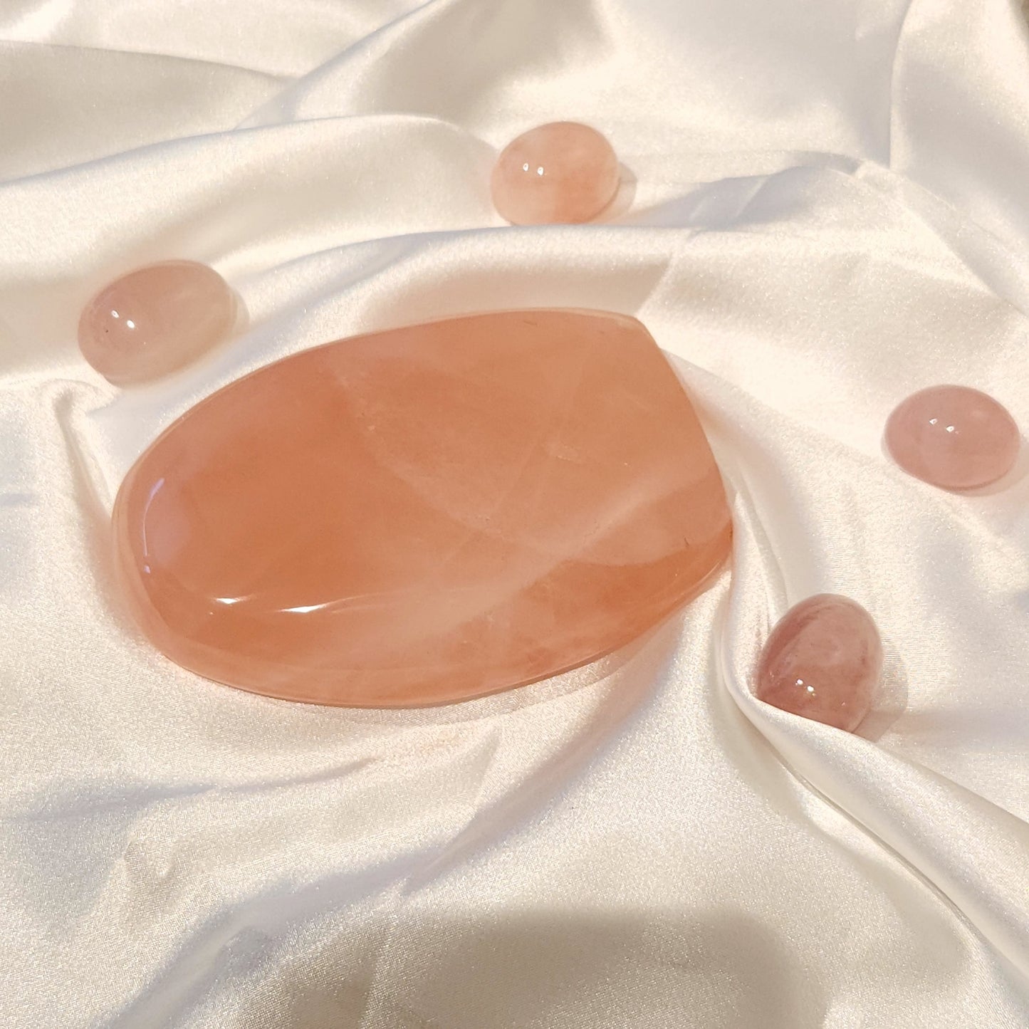 Madagascar Rose Quartz Crystal With Rainbow Laying flat